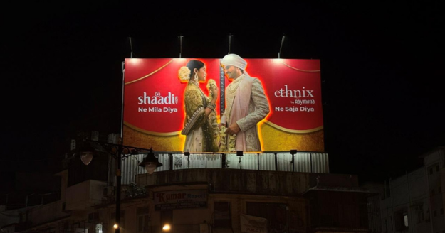 Ethnix by Raymond and Shaadi.com collaborative Mumbai billboard created by MOMS Outdoor, symbolising two pieces uniting like tying the knot