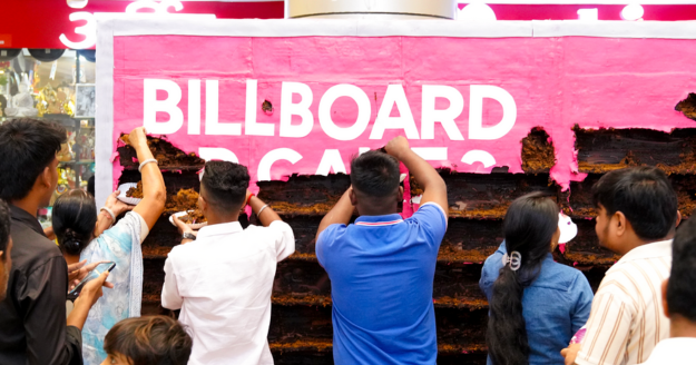 A 6-foot edible billboard created by Sociowash for Myntra M-Now’s 1st birthday, installed at Maxus Mall Borivali, designed to resemble a real billboard and surprise mall visitors when they discover it is entirely made of cake