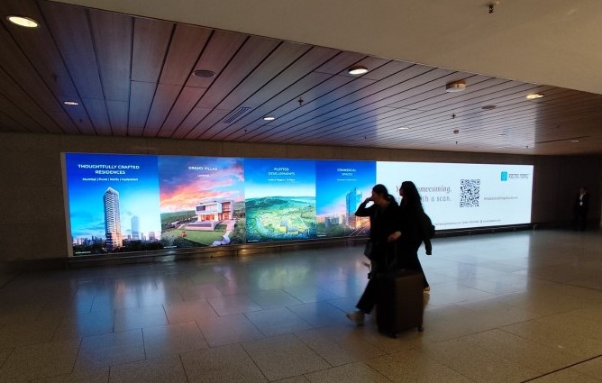 HNI audience targetingNRI marketing campaign Real estate advertising Context-aware advertising Digital billboard campaign DOOH media strategy Airport media campaign Premium OOH advertising Data-driven advertising Brand visibility campaign